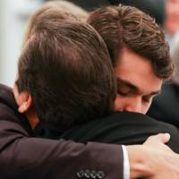 Dr. Ceglarek hugging son